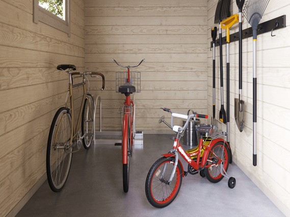 L'intérieur de l'abri moto ROVETO aves des vélos