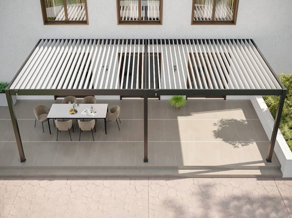 Vue aérienne du pergola bioclimatique HALO adossée avec des lames ouvertes